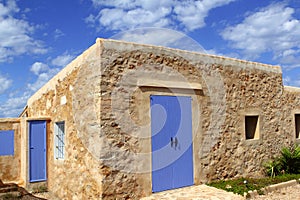 Stone house masonry blue sky door windows