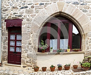 Stone house purpel wood door window