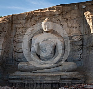 Stone image of Buddha Gautama in dhyana mudra photo