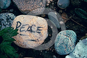 Stone with the inscription Peace
