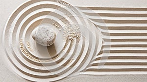 Stone inside circles in raked sand. Japanese zen garden. Serenity meditation harmony concept