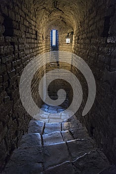 Dark crypt with rectangular window photo