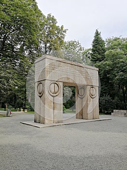 Stone kiss gate sculpture in the park