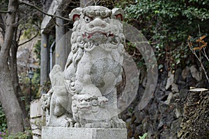 Stone Komainu Guardian on Pedestal with Baby Lion