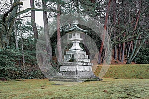 Stone lantern monument at Japanese graveyard, Nodoyama, Kanazawa, Ishikawa Prefecture, Japan photo