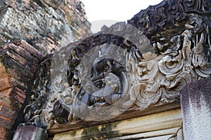 Stone lintel carved over the ruin door of Prang Song Phi Nong in archaeological site of Srithep ancient town in Petchaboon.