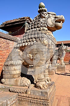 Stone Lion at Bhaktapur Durbar Square photo