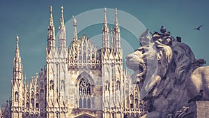 The stone lion on Cathedral Square in Milan, Italy