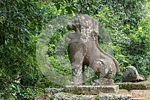 Stone lion guarding entrance to East Mebon