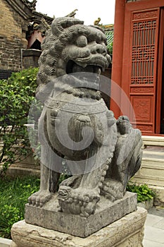 Stone lion guarding The Guildlhall Kaifeng