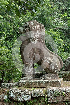 Stone lion guards entrance to East Mebon