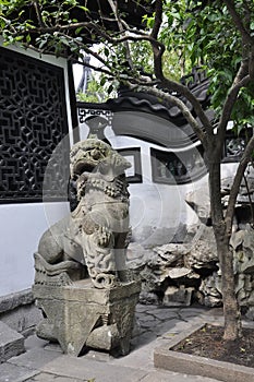 Stone Lion sculpture in the famous Yu Garden courtyard on downtown of Shanghai