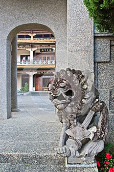 Stone lion and temple