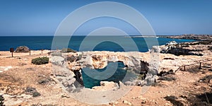Stone Love Bridge on the sea coast. Cyprus, Cape Greco.