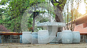 Stone made furniture at the courtyard of Chinese traditional garden