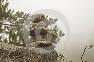 Stone marker in mountain trail