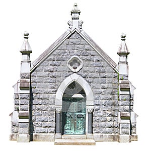 Stone mausoleum with Christian symbols and wrought-iron gate, isolated on a white background