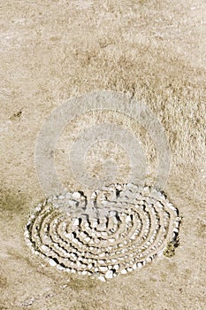 Stone maze on ground in Hiiumaa, Estonia photo