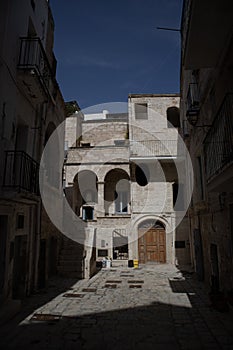 Stone mediaval houses in Polignano a Mare city with no people