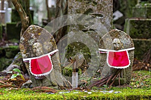 stone memorial statues inside the Okunoin cemetery