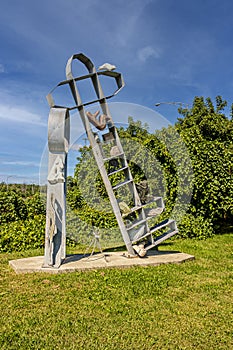 Stone and metal sculpture at Lâ€™Atelier 213 Inc is a non-profit organization