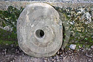 Stone money, Yap Islands, Federated States of Micronesia, West Pacific. Ancient round stone with hole, old currency photo