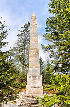 Stone monument of Adalbert Stifter - writer of Sumava Mounains - above Plechy Lake, Sumava National Park, Czech Republic