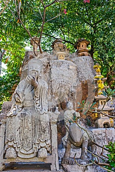 Stone monument in Wat Suthat buddist temple, Bangkok