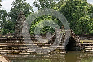 Stone monuments in pond at Neak Pean