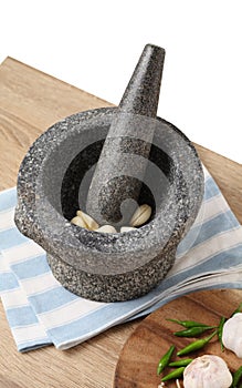 Stone Mortar and Pestle on wooden table