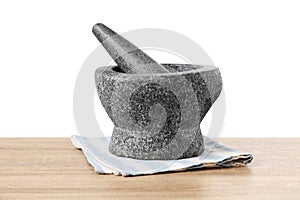Stone Mortar and Pestle on wooden table