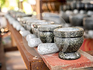 Stone Mortar and Pestles Arranging in Rows