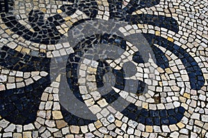 Stone mosaic on the street of Lisbon