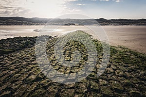 The stone mound on the beach.