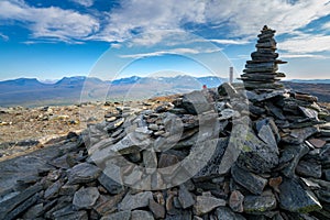 Stone mound on top of Nuolja, or Njulla, mountain in Abisko National Park in arctic Sweden. Lapponian gate, or Lapporten