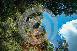 Stone mountain with blue sky in erawan waterfall natiaonal park