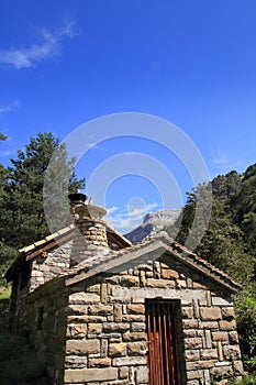 Stone mountain house in Pyrenees mountains