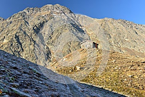 Stone mountain hut at the pass. Oetztal Alps, Soelden, State of Tyrol, Austria