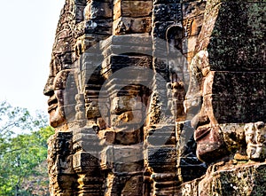 Stone murals and statue Bayon Temple Angkor Thom. Angkor Wat the