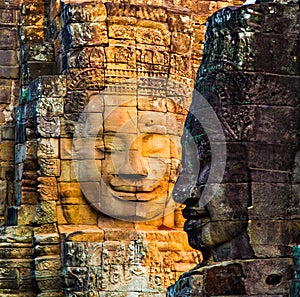 Stone murals and statue Bayon Temple Angkor Thom. Angkor Wat the