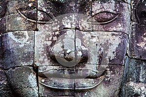 Stone murals and statue Bayon Temple Angkor Thom. Angkor Wat the photo