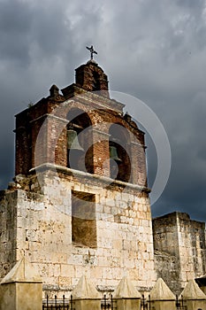 Stone old church under gloomy sky with clouds