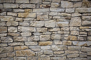 Stone old wall texture. Old rock blocks in old medieval brick.