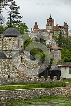 Stone orthodox church near Bran Castle among the Transylvanian forests