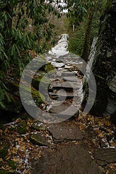 Stone path and a frozen cascade falls