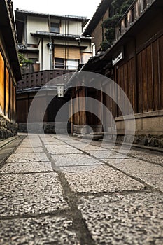 Stone path in Kyoto historic residential area.
