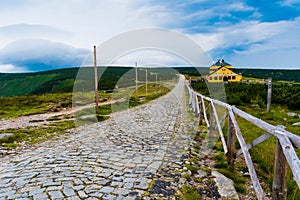 Stone path leading from Snezka Mountain