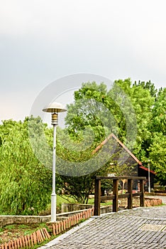 The stone path and streetlamp