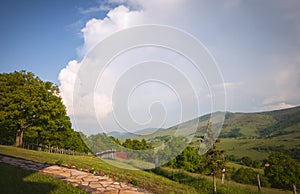 Stone paths, forest and clouds
