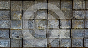 Stone pattern of stacked rock, background of grey bricks, paving industry
